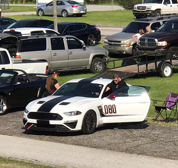 Karen Duquette and John Smythers getting in the Mustang