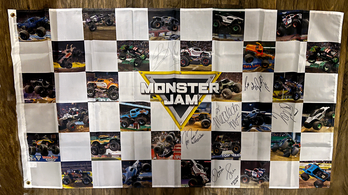 Monster Jam flag with signatures