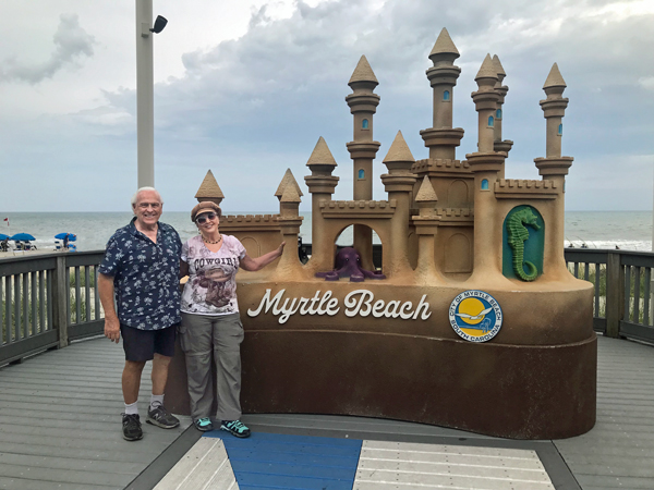The two RV Gypsies at the Myrtle Beach sandcastle sign