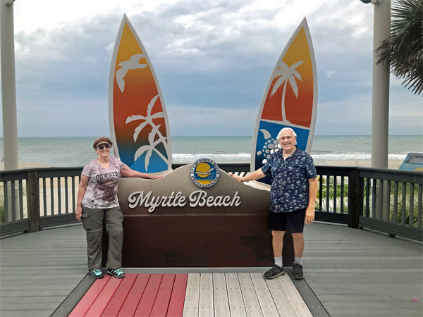 The two RV Gypsies at the Myrtle Beach surfboard sign
