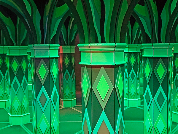 green Colored lights in the mirror maze