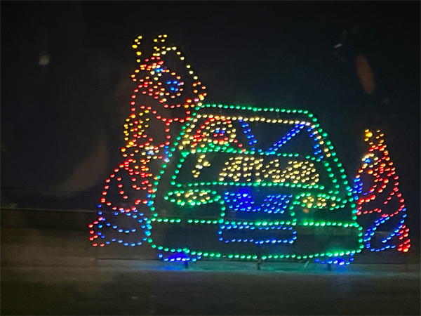 reindeer and a car in lights