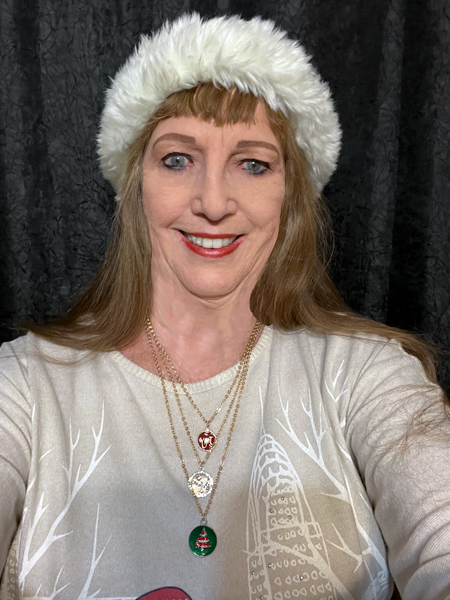 Karen Duquette in a Christmas hat