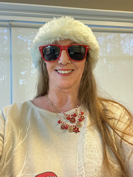 Karen Duquette in a Christmas hat 