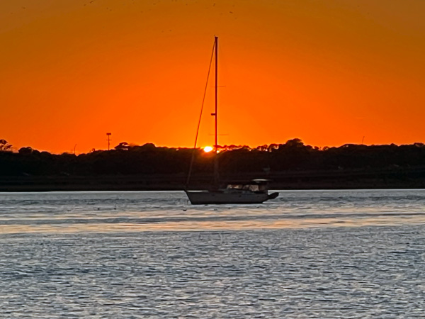 sailboat and  sunset