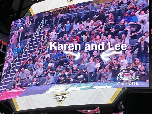 Lee and Karen Duquette on screen at the Monster Jam