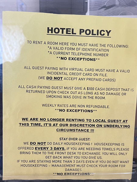 Red roof Inn Hotel policy sign