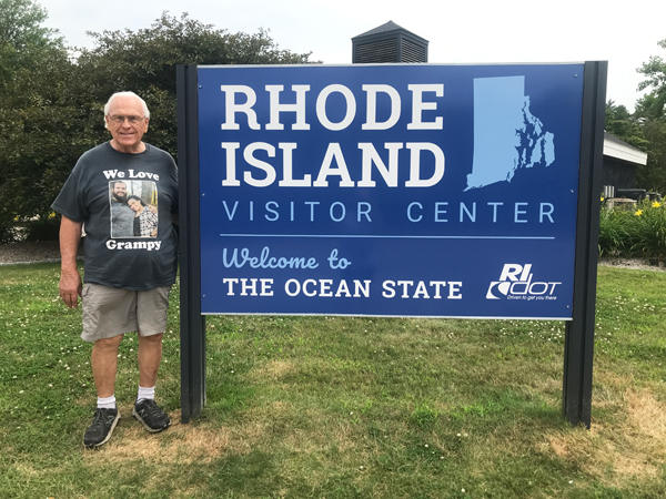 Lee Duquette at the RI visitor sign