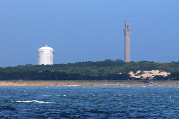 unlabeled water tower and a tall tower