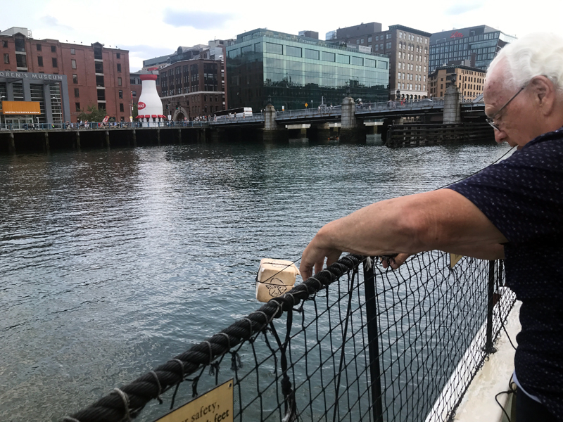 Lee Duquette throwing  tea overboard