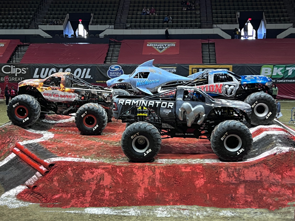 four Monster Trucks on the mond