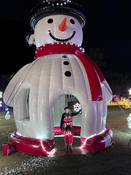 Karen Duquette and a big snowman