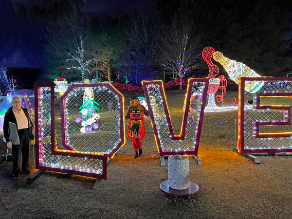 Lee and Karen Duquette by the Giant Love Sign 