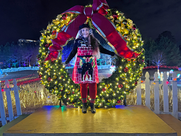 Karen Duquette at the giant wreath