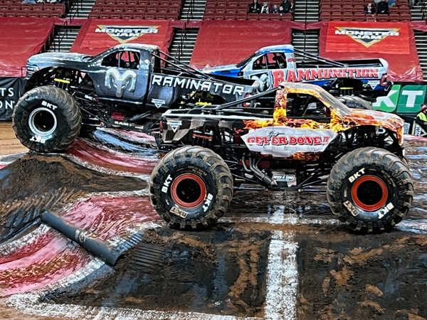 Three Monster Trucks on the mond