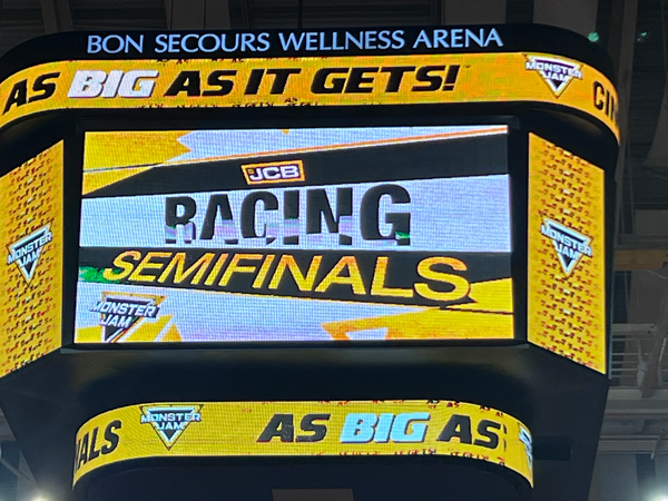 JCB racing semi-finals sign