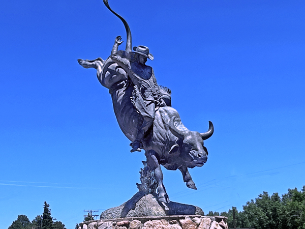 a  bucking cowboy statue