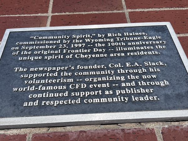 Community Spirt statue sign