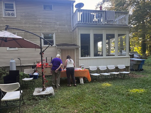Lee and Lisa Duquette preparing the food table