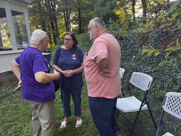Lee Duquette greets Gary's wife