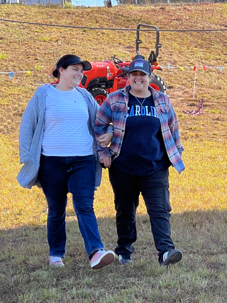 Two happy people returned to Earth