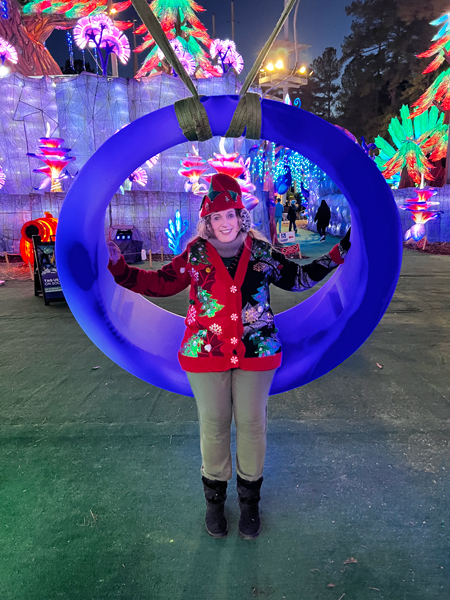 Karen Duquette on a  purple swing