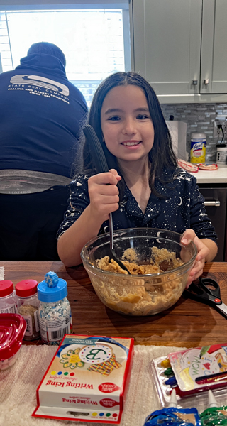 Gabriella mixing cookie dough