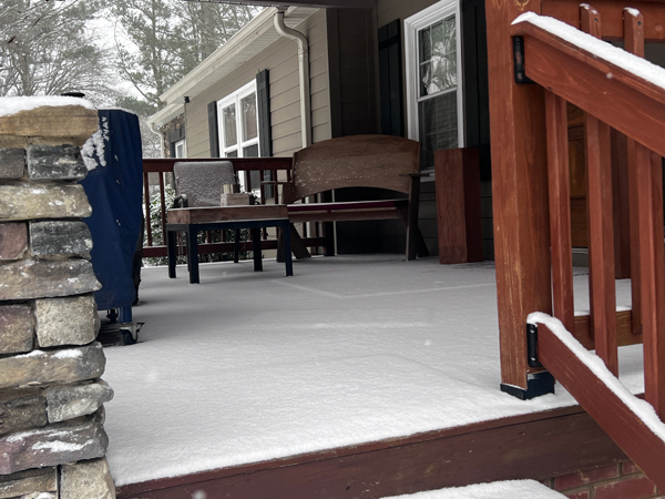 snow covered porch