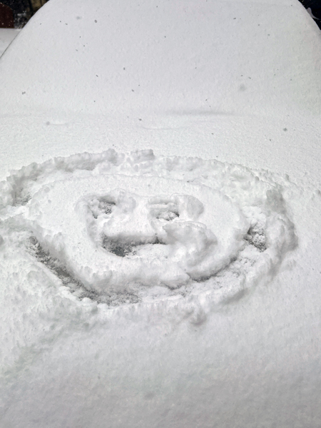 weird smile face in the snow