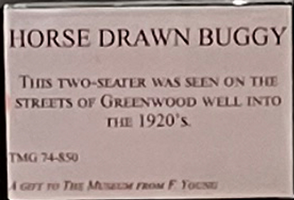Horse Drawn Buggy and sign