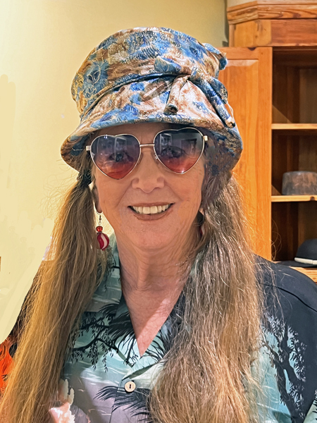 Karen Duquette tried on an old hat