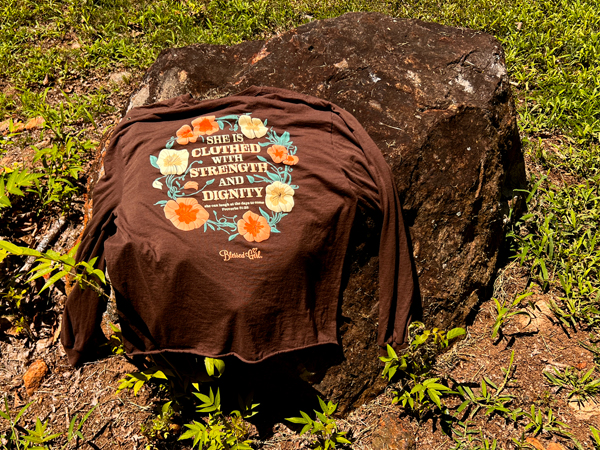 a big rock with a sweater on it