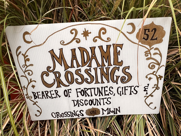 52-Madame-Crossings -sign