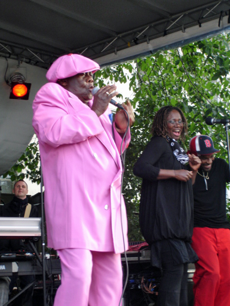 singer in a pink suit