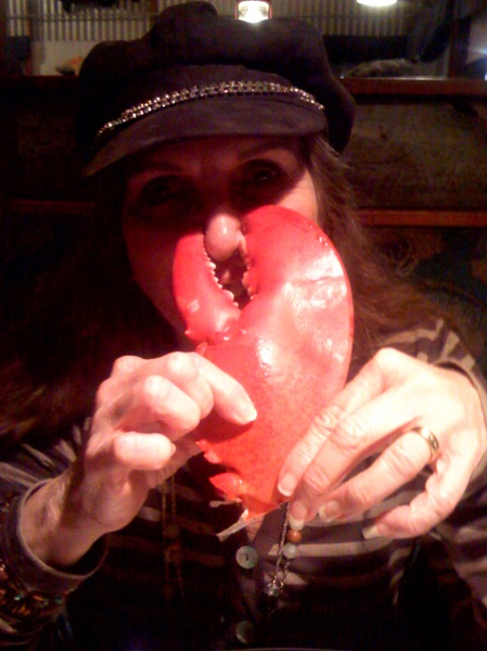 Karen Duquette's birthday lobster biting her nose