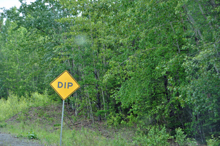 sign - dip in road