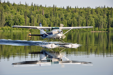 floatplane reflected in the lake