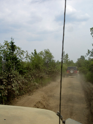 dust from jeep in front