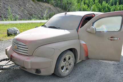 mud caked on the car