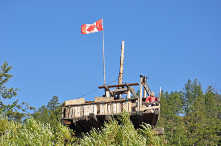 Canadian flag on top of house
