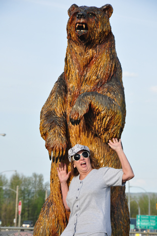 a sculptured bear attacking Karen