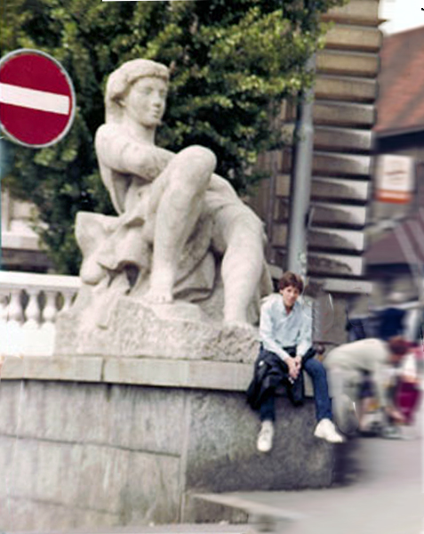 Brian Duquette at a statue