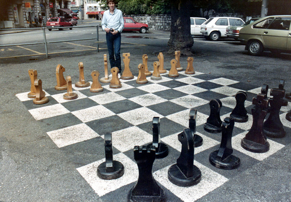 Brian Duquette and a giant chess set in Ouchy