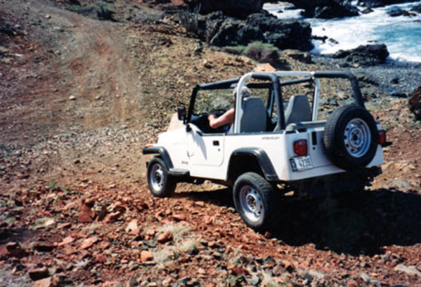 Lee Duquette ready to drive the jeep downhill in Aruba