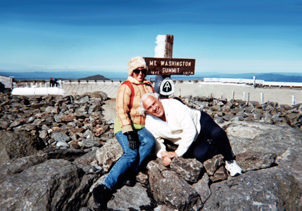 Karen and Lee Duquette at the Mt. Washington Summit sign