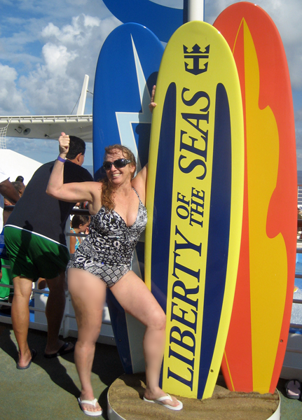 Karen Duquette and The Liberty of the Seas surfboard