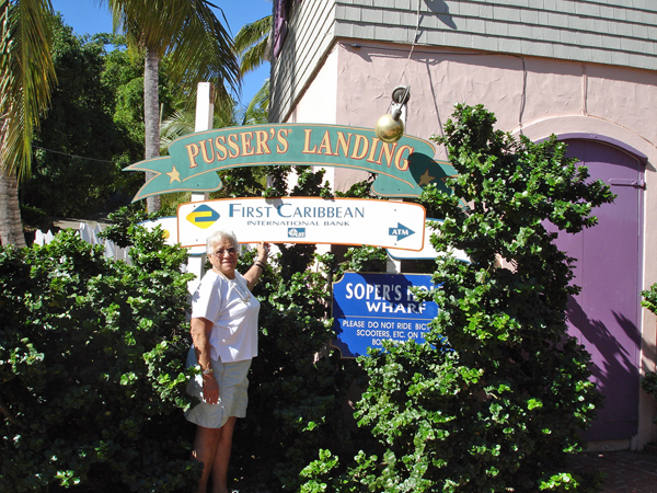 Jean Daino at Soper's Hole Wharf sign