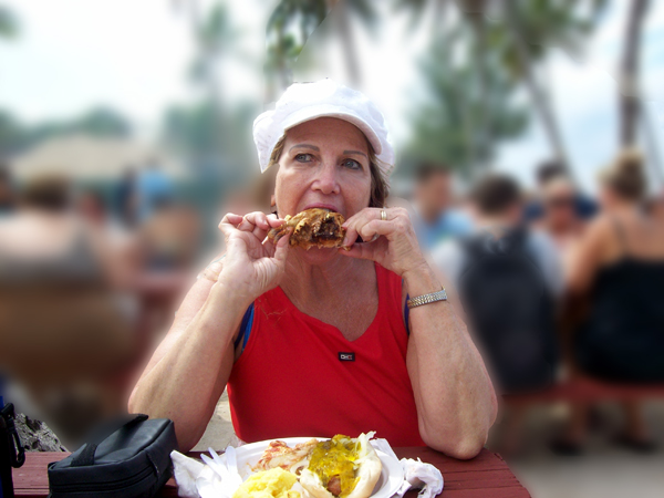 Karen Duquette eating chicken