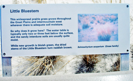 sign about the prairie grass