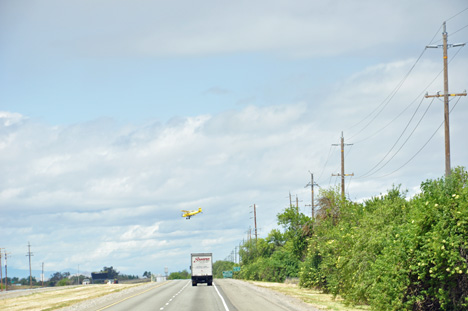 A yellow bi-plane